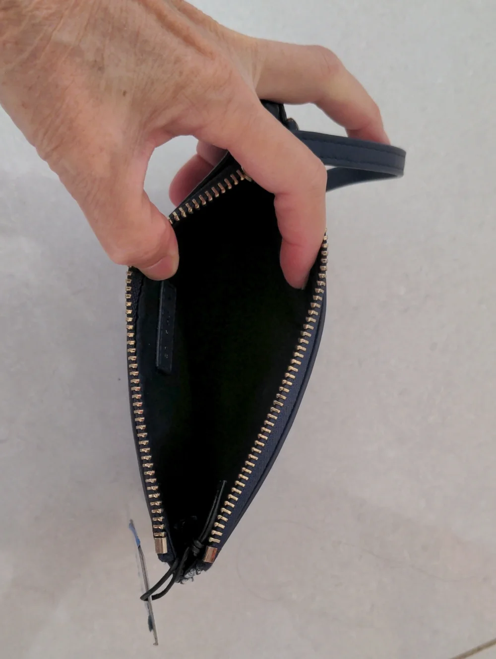 Cole Haan compact wristlet